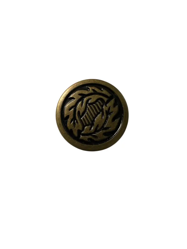 Antique gold leaf pattern jeans button.